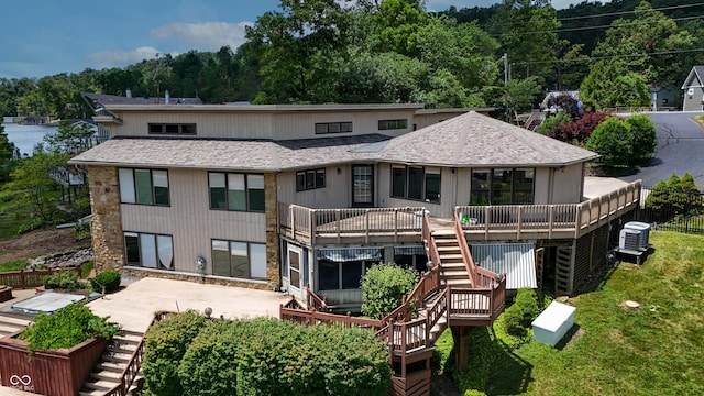 4161 S Summit Ln, Columbus, IN 47201 - rear view of house featuring stairway, a deck, a shingled roof, and a patio area