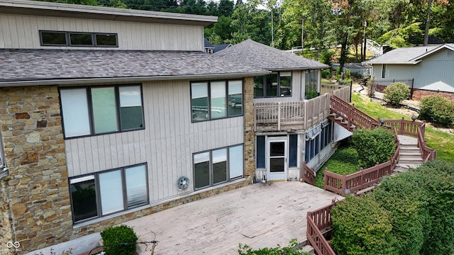 4161 S Summit Ln, Columbus, IN 47201 - back of house with a shingled roof, stone siding, a wooden deck, and stairway