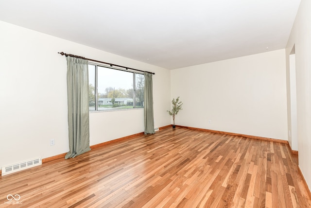 empty room featuring light hardwood / wood-style floors