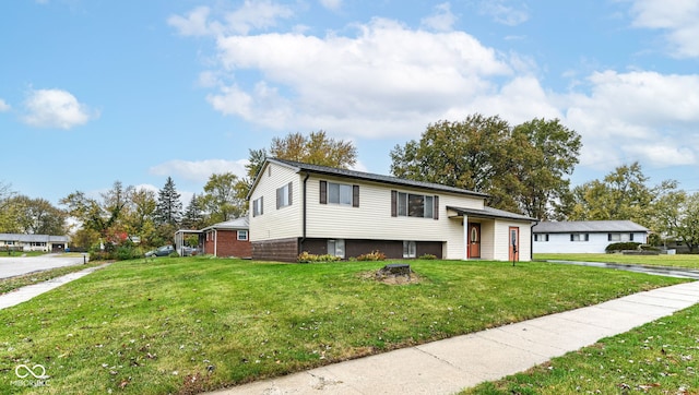 view of front of home featuring a front lawn