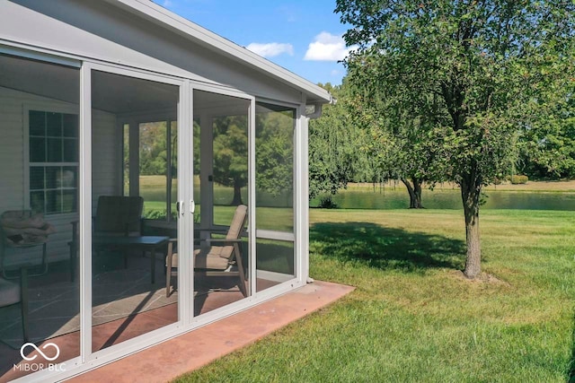 view of yard featuring a sunroom