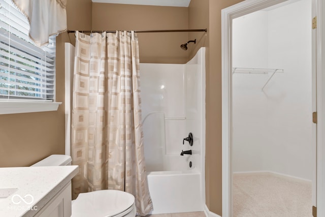 full bathroom featuring vanity, shower / bath combination with curtain, and toilet