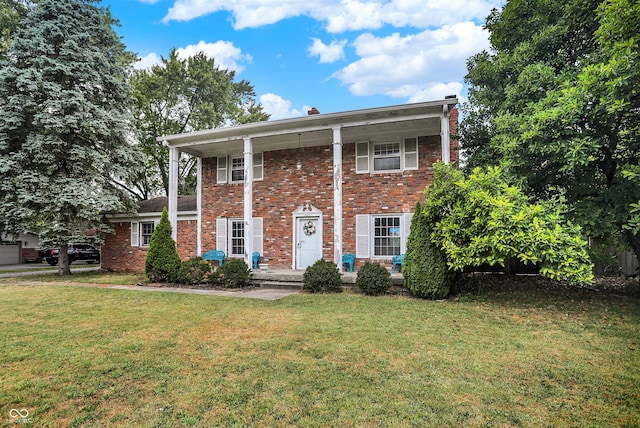 view of front of home with a front yard