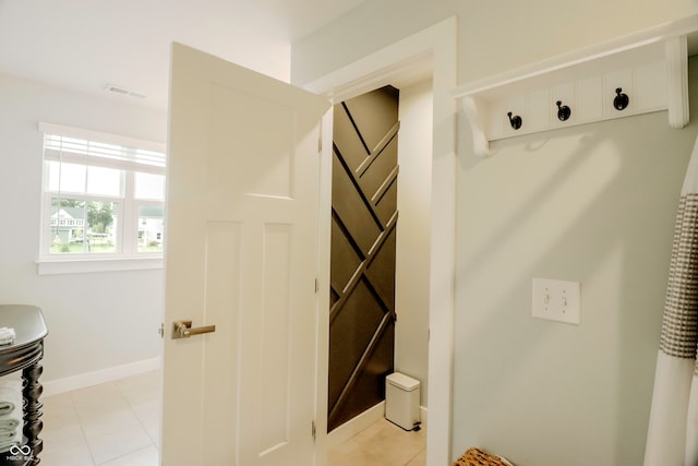 bathroom with tile patterned floors