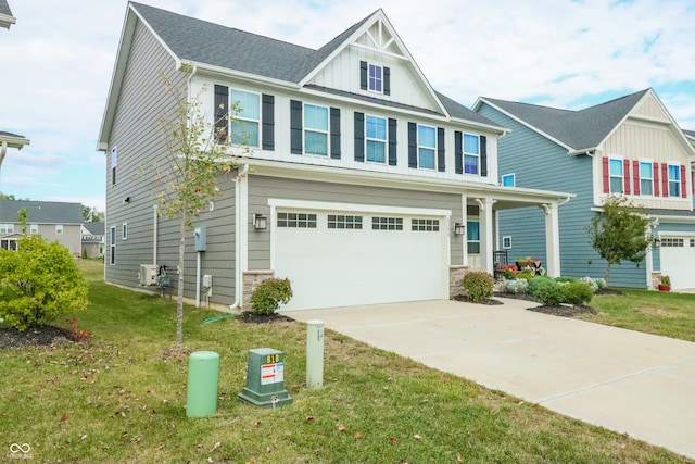 view of front of home with a garage and a front yard