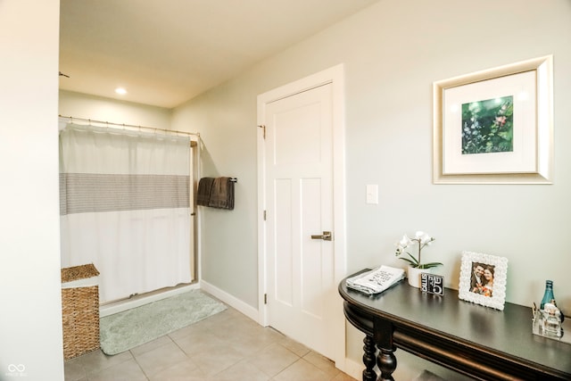 bathroom featuring a shower with curtain and tile patterned floors