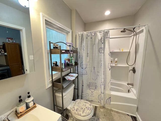 full bathroom featuring shower / bath combo, toilet, and sink