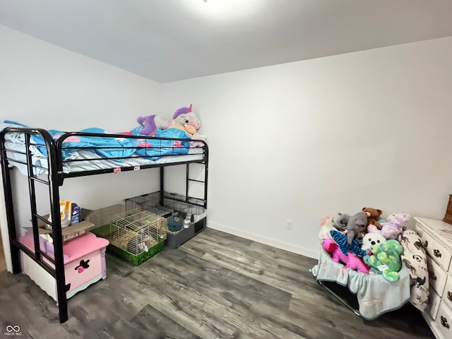 bedroom featuring dark wood-type flooring