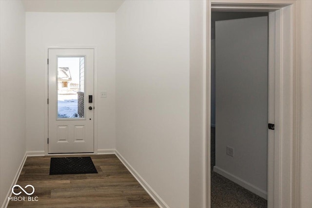 entryway with dark wood-type flooring