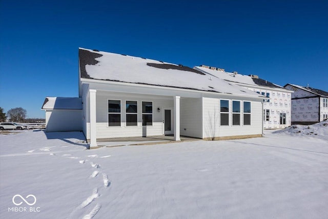 view of snow covered property