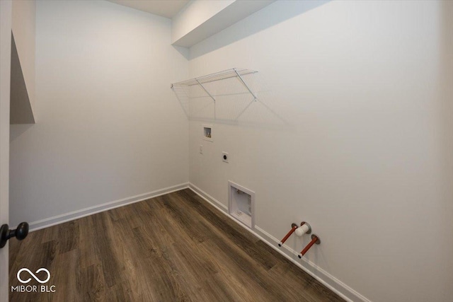 laundry room with washer hookup, gas dryer hookup, and dark hardwood / wood-style flooring