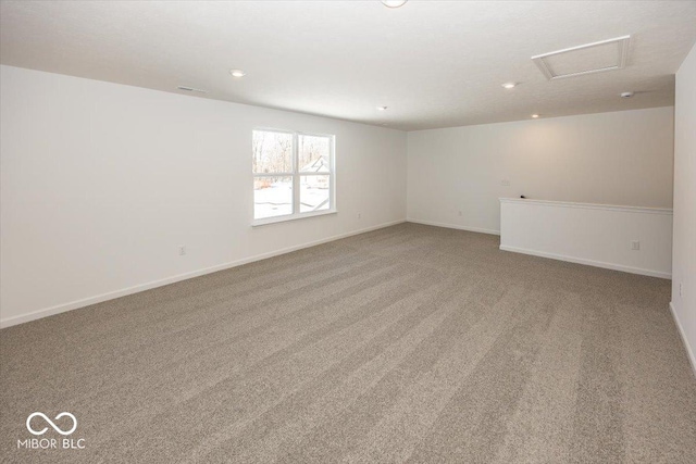 empty room with light colored carpet