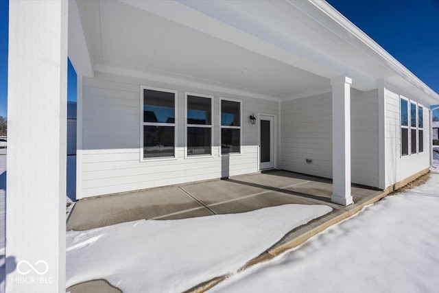 view of patio / terrace with a carport