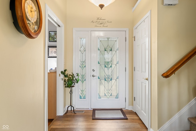 entrance foyer featuring hardwood / wood-style flooring