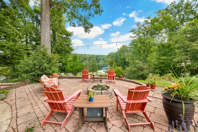 view of patio / terrace featuring a fire pit