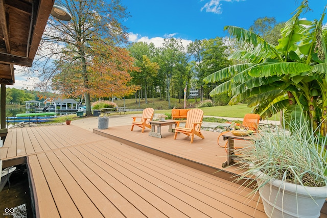 wooden deck with a yard