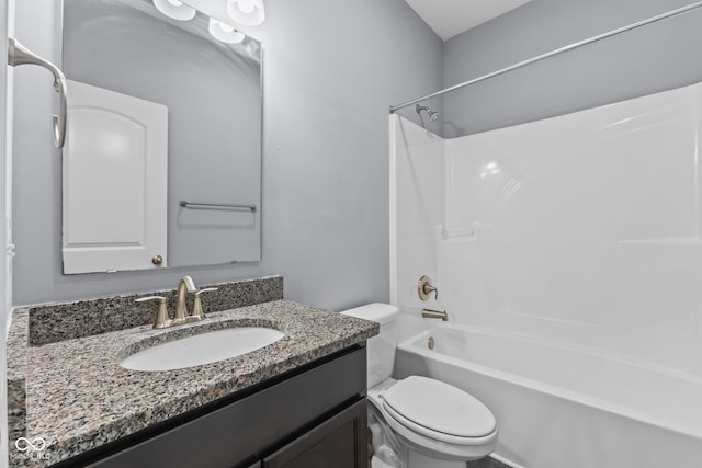 full bathroom featuring vanity, toilet, and bathing tub / shower combination