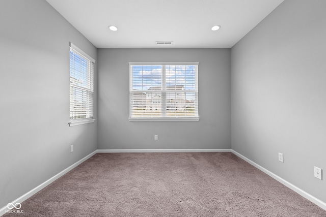 view of carpeted spare room