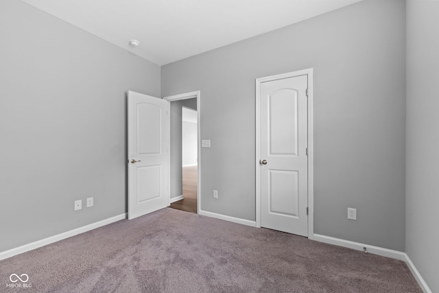 unfurnished bedroom featuring carpet floors