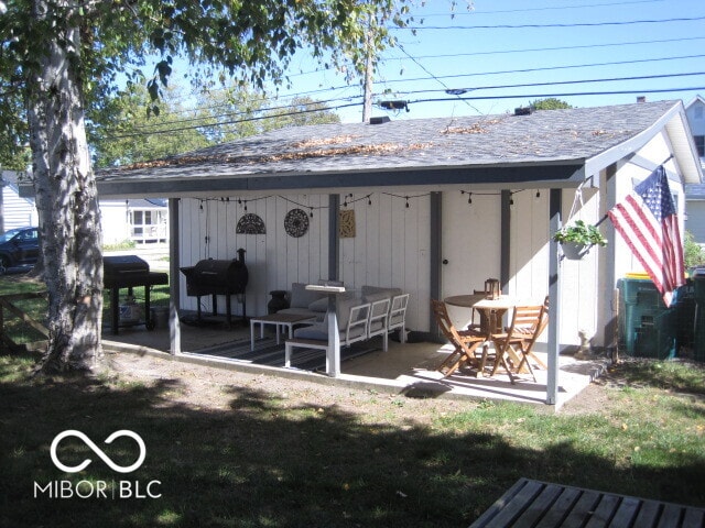 rear view of house featuring a patio