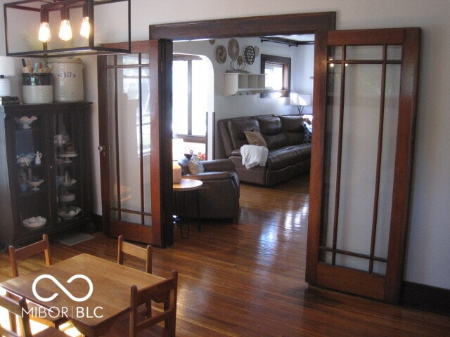 dining area with dark hardwood / wood-style floors