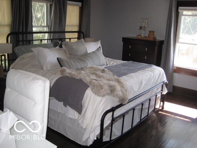 bedroom featuring dark hardwood / wood-style floors