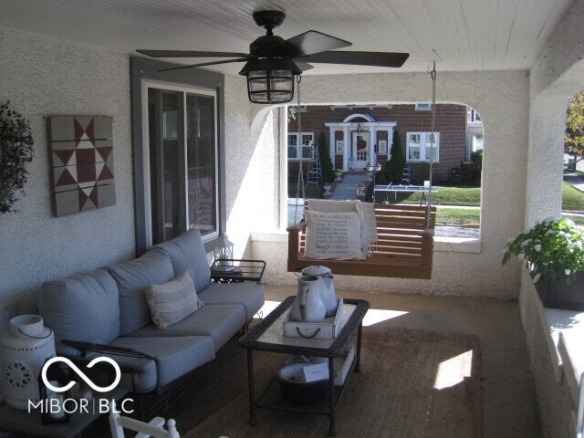 view of patio / terrace with french doors and ceiling fan