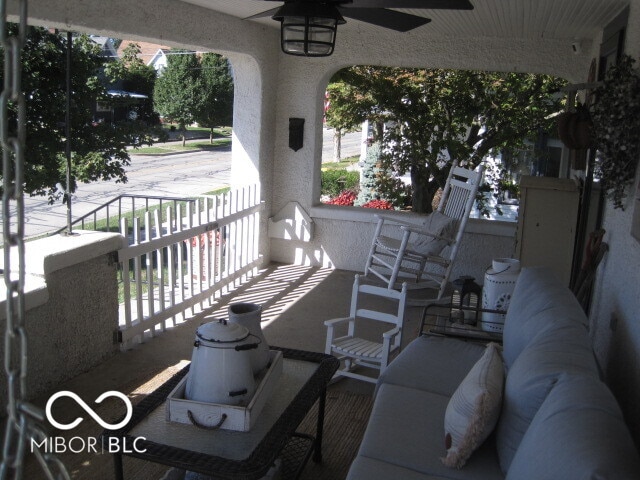 view of patio featuring ceiling fan