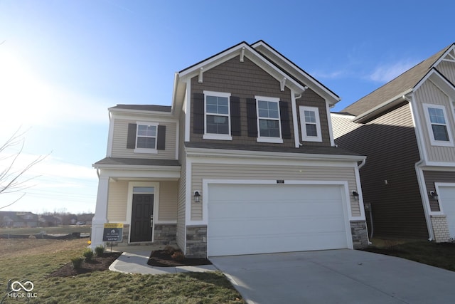 view of front of property featuring a garage