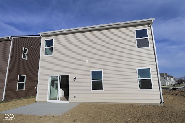 rear view of house featuring a patio area