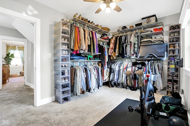 spacious closet with carpet flooring and ceiling fan