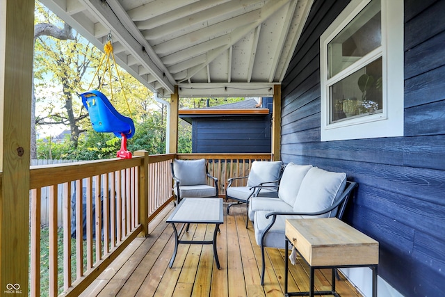 deck with an outdoor hangout area