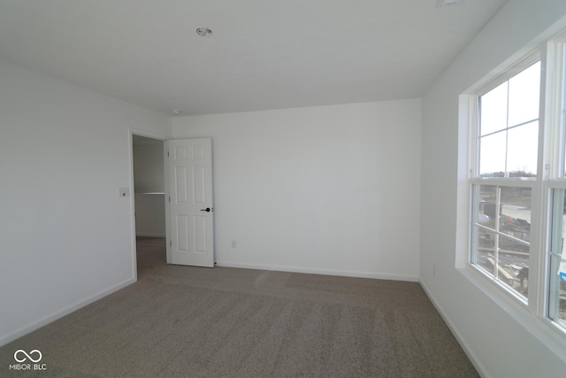 view of carpeted spare room