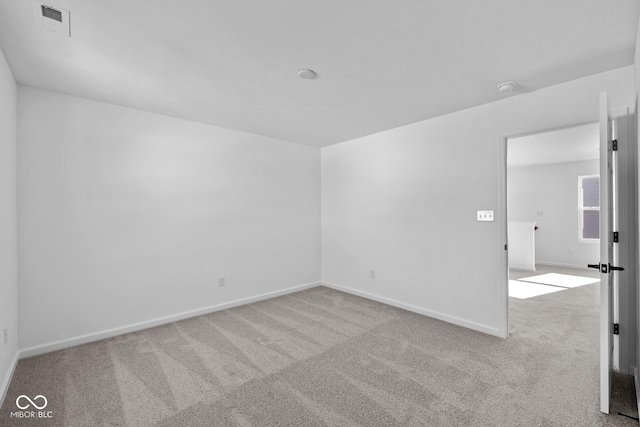 empty room with light carpet