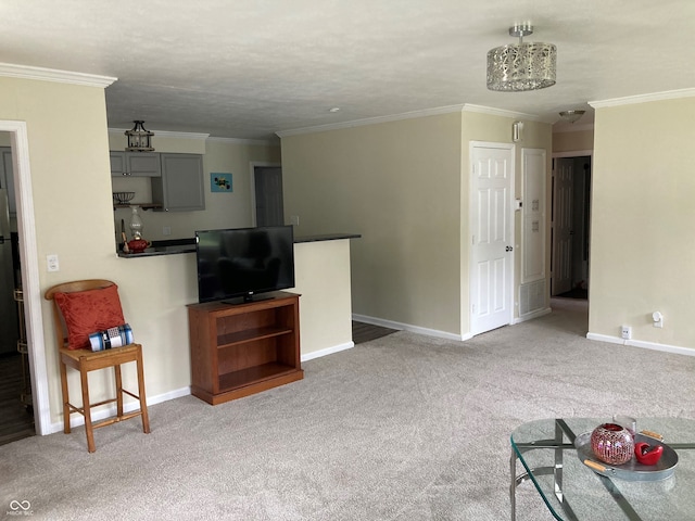 living room with ornamental molding and carpet flooring