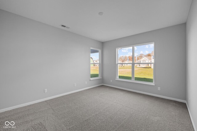 10618 Maidenhair Dr, Indianapolis, IN 46239 - carpeted empty room featuring baseboards