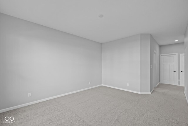 10618 Maidenhair Dr, Indianapolis, IN 46239 - carpeted empty room featuring baseboards and recessed lighting