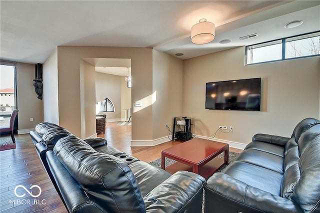 living room featuring hardwood / wood-style flooring and plenty of natural light