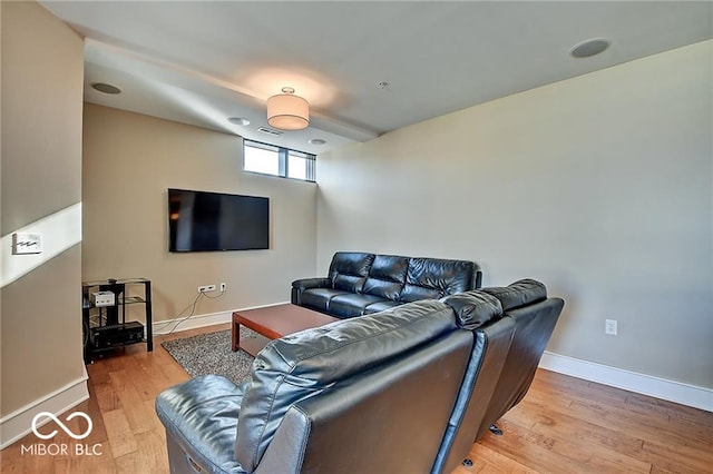 living room with light hardwood / wood-style floors