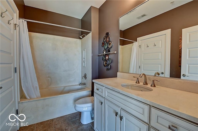 full bathroom featuring tile patterned flooring, vanity, toilet, and shower / bath combination with curtain