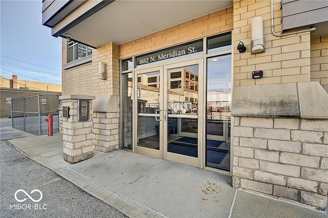 property entrance featuring french doors