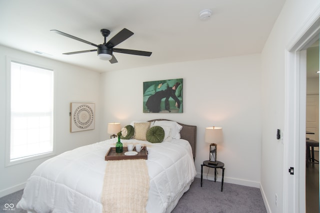 bedroom featuring ceiling fan and carpet floors