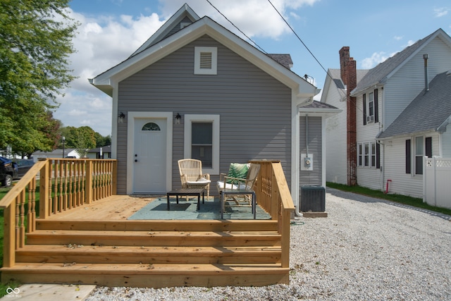 rear view of property with a deck