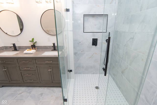 bathroom featuring walk in shower and vanity