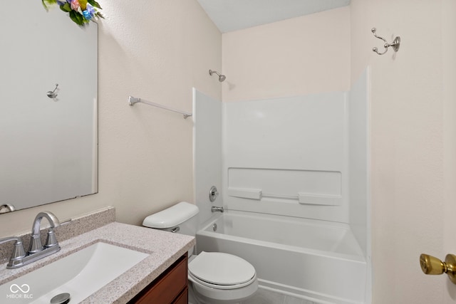 full bathroom with washtub / shower combination, vanity, and toilet