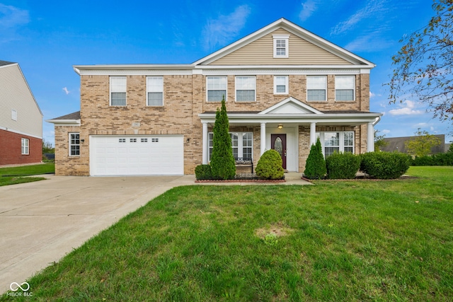 view of front of house with a front lawn and a garage