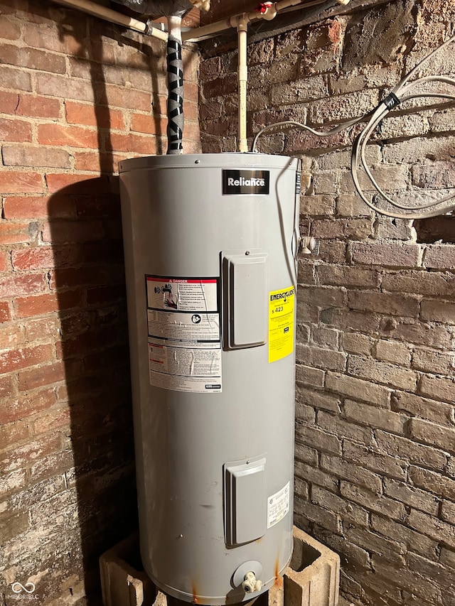 utility room with water heater