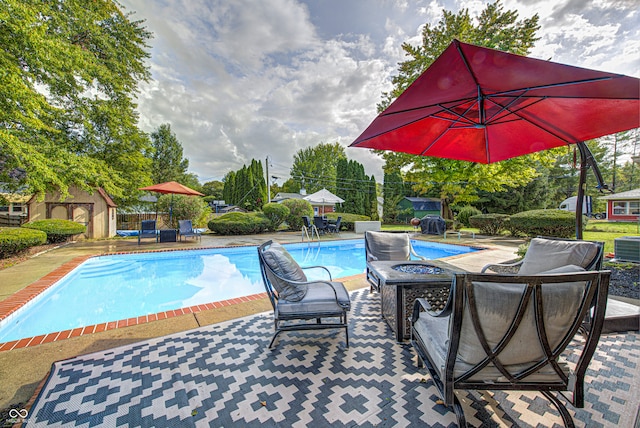 view of pool with a patio