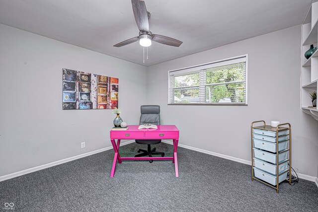 carpeted office featuring ceiling fan