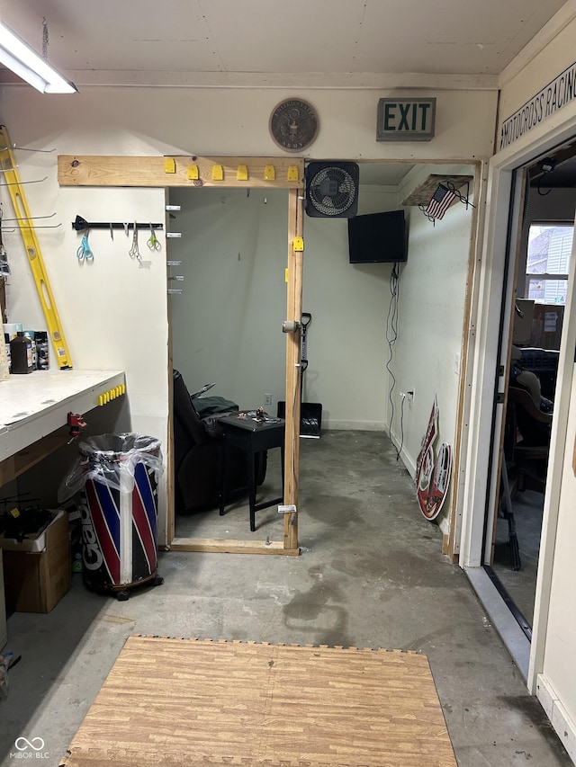 basement with a workshop area